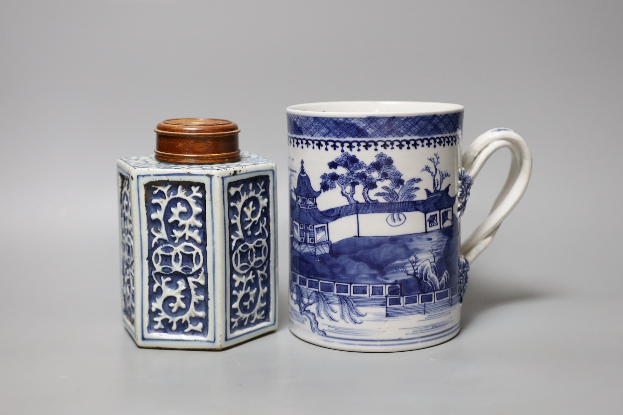 A Chinese blue and white tankard and a jar and cover, tankard 15.5 cms high